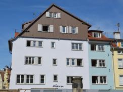 Wohn- und Geschäftshaus mit PaXretro58 aus Eukalyptus in Lindau