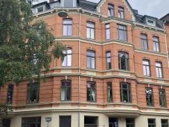 Jahrhundertwende Eckhaus saniert Backsteinfassade Holzfenster Denkmalschutz 